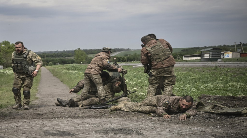 جنود أوكرانيون قرب خط المواجهة في منطقة دونباس شرق أوكرانيا، 21 أيار/مايو 2022. (أ ف ب)