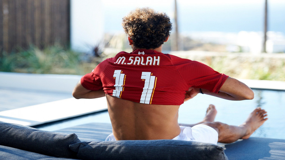 المصري محمد صلاح بعد إعلان توقيع عقد جديد مع ليفربول. (أ ف ب)