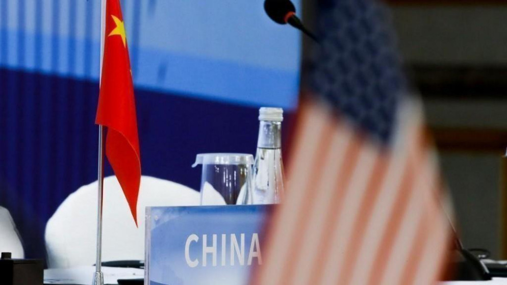 علما الولايات المتحدة والصين، 30 كانون الثاني/يناير 2019. توماس بيتر/ أ ف ب