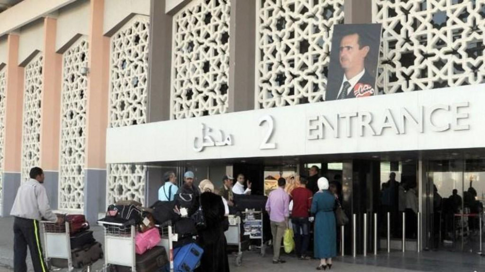 مطار دمشق الدولي. 14 أبريل 2013. (أ ف ب)