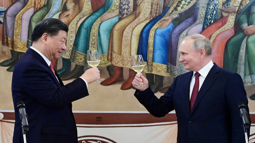 الرئيس الروسي فلاديمير بوتين ونظيره الصيني شي جينبينغ. (رويترز)