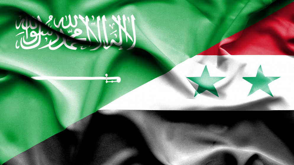 صورة توضيحية لعلمي السعودية وسوريا. (istockphoto)